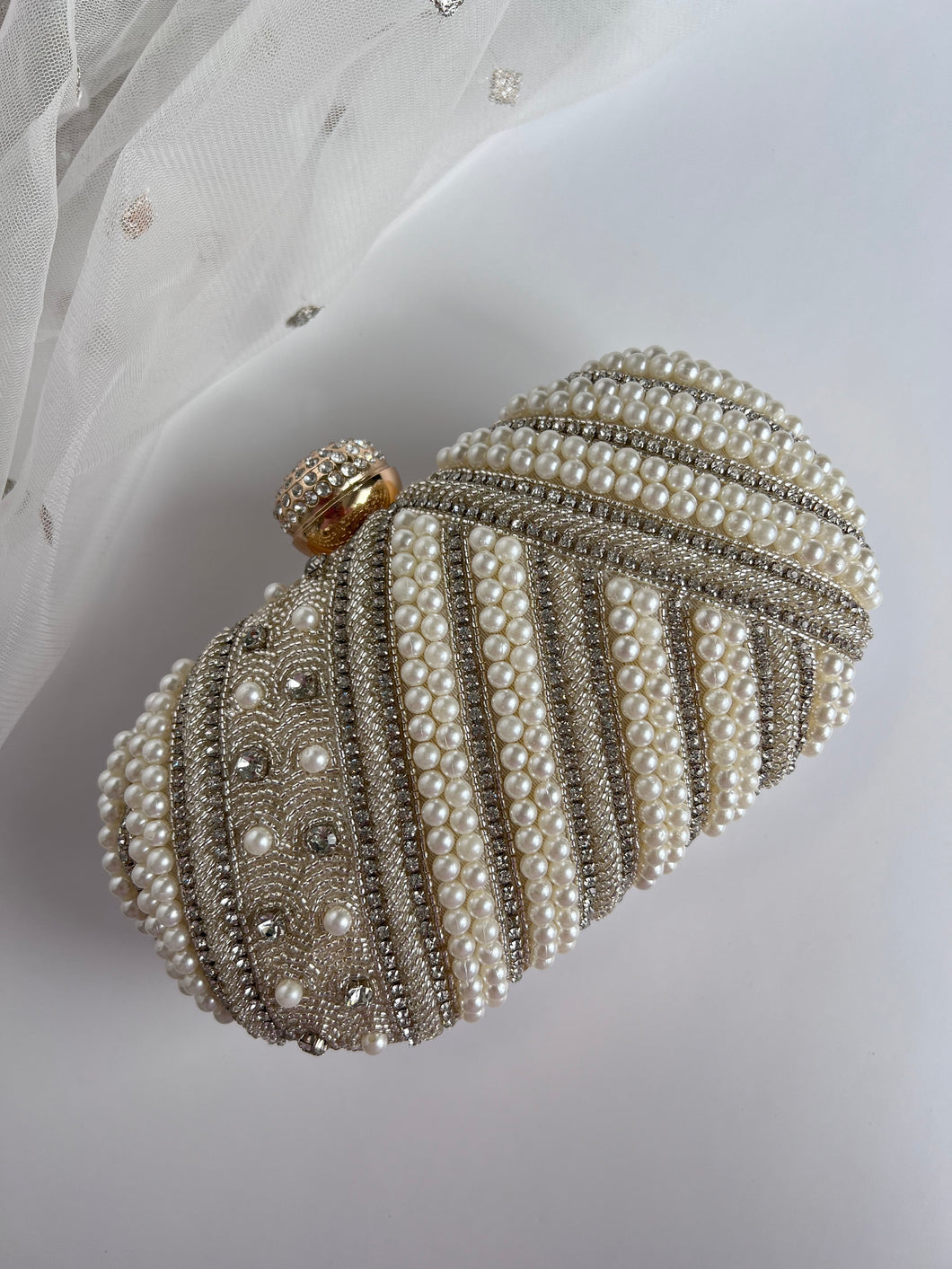 Heer Oval Clutch